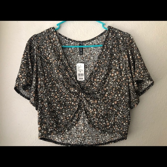 Tops - Flower print blouse with a deep v neck. Never worn